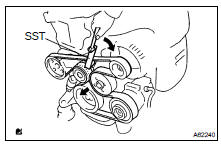  REMOVE FAN AND GENERATOR V BELT