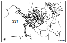 REMOVE CRANKSHAFT PULLEY