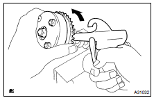 REMOVE CAMSHAFT TIMING GEAR ASSY