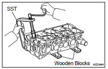 REMOVE INTAKE VALVE