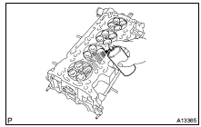 INSPECT CYLINDER HEAD FOR CRACKS