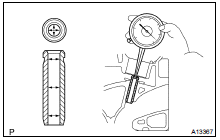 INSPECT EXHAUST VALVE GUIDE BUSH