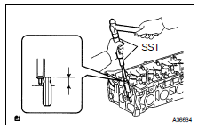 INSTALL INTAKE VALVE GUIDE BUSH