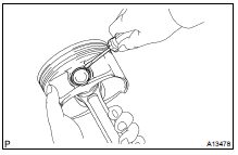 REMOVE PISTON PIN HOLE SNAP RING