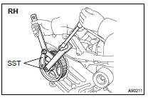 REMOVE CAMSHAFT TIMING PULLEY