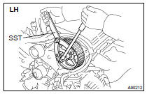 REMOVE CAMSHAFT TIMING PULLEY