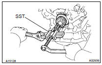 REMOVE CRANKSHAFT TIMING PULLEY