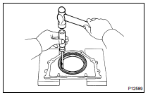 REMOVE ENGINE REAR OIL SEAL