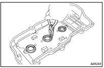 REMOVE SPARK PLUG TUBE GASKET