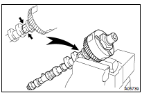 REMOVE CAMSHAFT TIMING GEAR ASSY