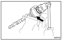 REMOVE CAMSHAFT TIMING GEAR ASSY