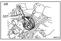 REMOVE CAMSHAFT TIMING PULLEY