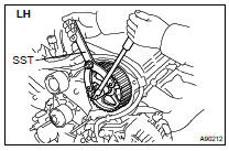 REMOVE CAMSHAFT TIMING PULLEY