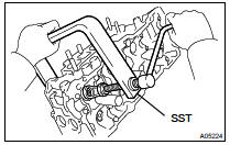 REMOVE INTAKE VALVE