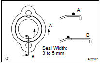 INSTALL WATER SEAL PLATE