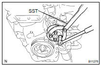 REMOVE WATER PUMP PULLEY