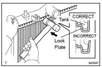 INSTALL RADIATOR TANK UPPER AND TANK LOWER