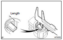 INSPECT GENERATOR BRUSH HOLDER ASSY