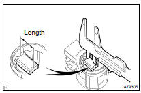 INSPECT GENERATOR BRUSH HOLDER ASSY