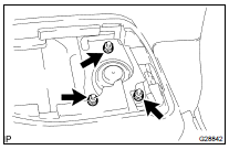 REMOVE REAR SHOCK ABSORBER WITH COIL SPRING