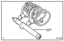  INSTALL SHOCK ABSORBER ASSY REAR LH