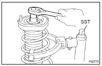  INSTALL SHOCK ABSORBER ASSY REAR LH