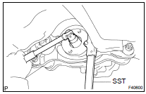 REMOVE REAR DRIVE PINION NUT