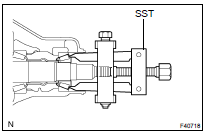 REMOVE REAR DRIVE PINION FRONT TAPERED ROLLER BEARING