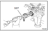 REMOVE REAR DIFFERENTIAL SIDE GEAR SHAFT SEAL OIL