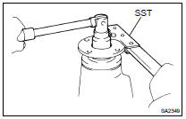 REMOVE REAR DRIVE PINION NUT