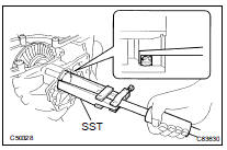 REMOVE TRANSFER CASE OIL SEAL