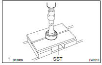 REMOVE FRONT DRIVE SHAFT BEARING