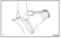 REMOVE OUTBOARD JOINT BOOT