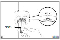 INSTALL FRONT DRIVE SHAFT DAMPER RH CLAMP