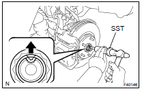 REMOVE FRONT AXLE HUB LH NUT