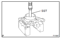 REMOVE FRONT AXLE HUB LH BEARING