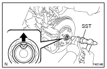 REMOVE FRONT AXLE HUB LH NUT