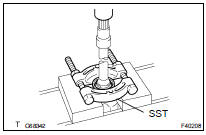 REMOVE FRONT DRIVE SHAFT DUST COVER (RH for 2WD DRIVE TYPE)