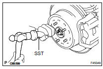 REMOVE REAR AXLE SHAFT LH NUT