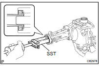 REMOVE TRANSFER EXTENSION HOUSING TYPE T OIL SEAL