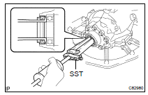 REMOVE TRANSFER RH BEARING RETAINER OIL SEAL