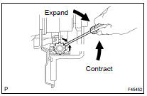 ADJUST PARKING BRAKE SHOE CLEARANCE