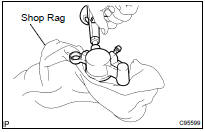 REMOVE REAR DISC BRAKE PISTON