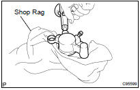 REMOVE REAR DISC BRAKE PISTON