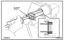 REMOVE CENTER DIFFERENTIAL CASE TAPERED ROLLER BEARING