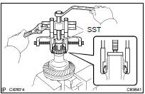 REMOVE CENTER DIFFERENTIAL CASE TAPERED ROLLER BEARING