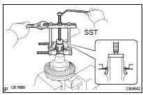 REMOVE CENTER DIFFERENTIAL CASE TAPERED ROLLER BEARING