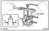 REMOVE CENTER DIFFERENTIAL CASE TAPERED ROLLER BEARING