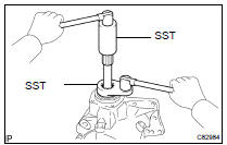 REMOVE DRIVEN PINION