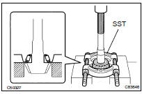 REMOVE TRANSFER DRIVEN PINION FRONT BEARING